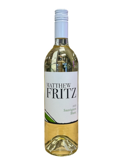 Tall, thin, clear glass wine bottle with white label