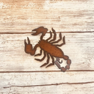 rustic steel magnet in the shape of a scorpion