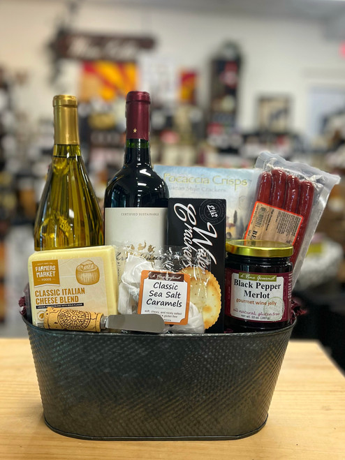 a tin basket with handles containing the contents of the basket. full content list in product description