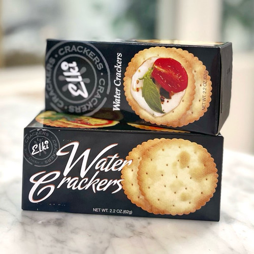 Two stacked Black long, rectangular box with image of crackers and lettering in black