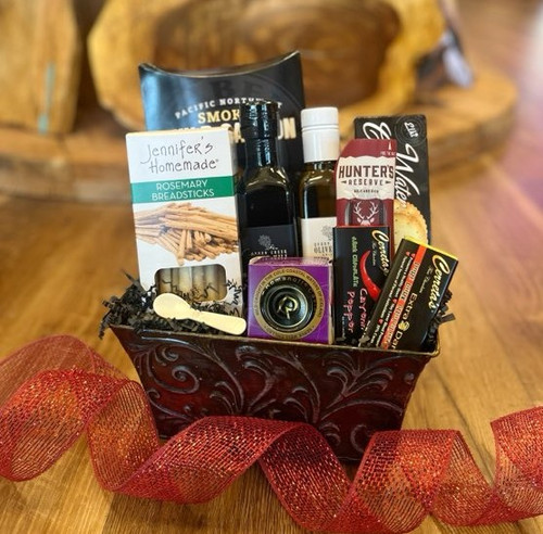 Rectangular metal container displaying contents of gift