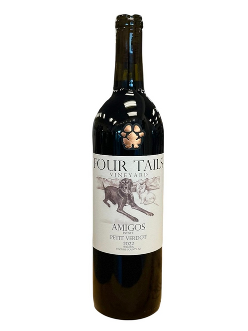 Dark glass wine bottle with light tan front label with image of two dogs laying down.