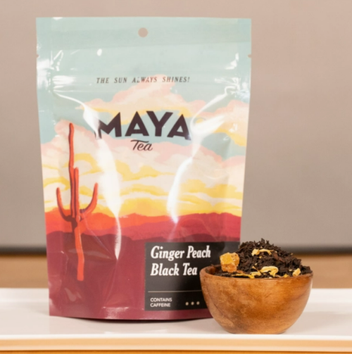 Plastic resealable food pouch with a desert sunset scape and cacti with black lettering