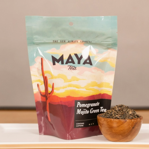 Plastic resealable food pouch with a desert sunset scape and cacti with black lettering