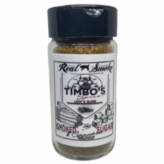 Clear jar with black cap, white label with black and red lettering 