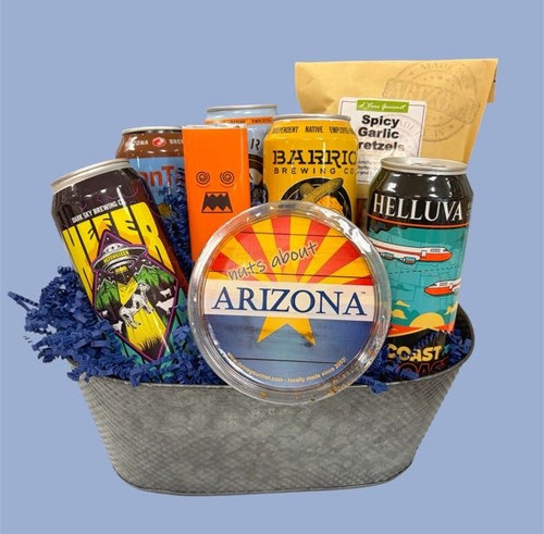 silver oblong shaped tin basket filled with 5 different craft beers and three snacks
