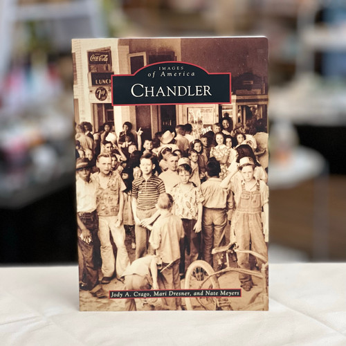 Book cover with old, historic photo of local children. Book cover with old, historic photo of local children.
