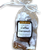 Clear cello bag containing individually wrapped caramels with square front label