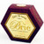 Rose colored hexagon box containing cheese spread.