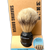 Shaving brush with tan bristles, black handle on a tan cardboard backing