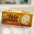 Yellow long, rectangular box with image of crackers and lettering in black
