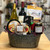 a tin basket with handles containing the contents of the basket. full content list in product description