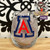 Clear stemless wine glass with the University of Arizona logo 'A'.