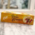 Yellow long, rectangular box with image of crackers and lettering in black
