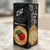 Black long, rectangular box with image of crackers and lettering in black standing on end