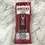 Clear and dark red rectangular packaging with off white label