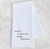 Unfolded towel laying on marble countertop