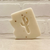 off white bar of soap in the shape of Arizona with a cut out in the shape of a saguaro cactus