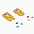 two mini yellow bean bag toss game boards with three blue and three red mini bean bags