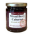 Round glass jar with gold lid containing dark red colored jelly.