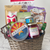 Brown oval gift basket displaying contents of gift