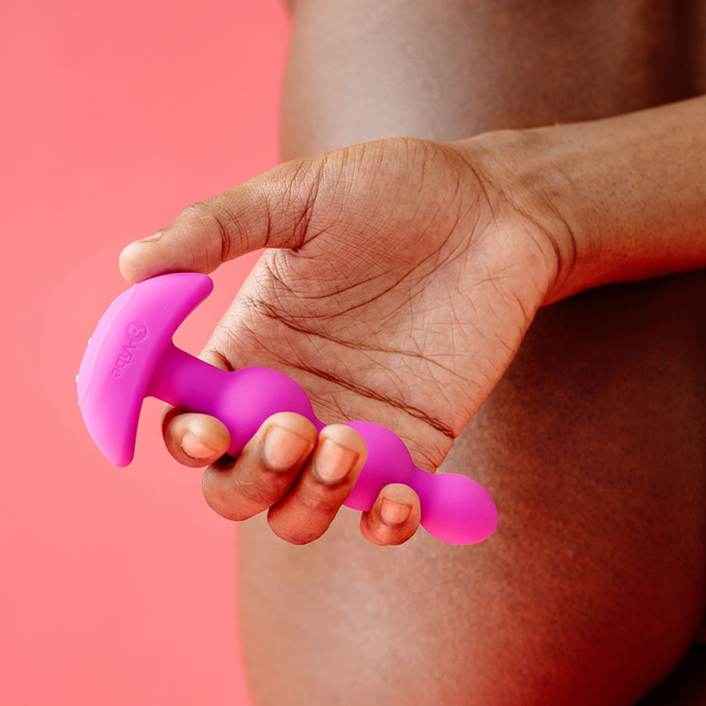 Fuchsia b-Vibe Remote Control Triplet Anal Beads - Lifestyle #1