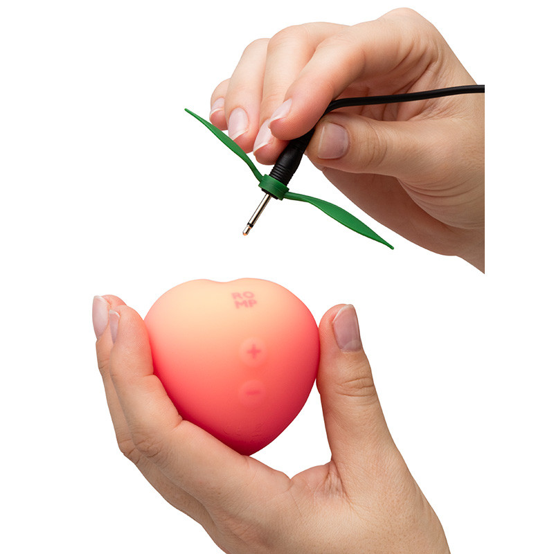 ROMP Pink Peach Clitoral Stimulator - Hand Charging