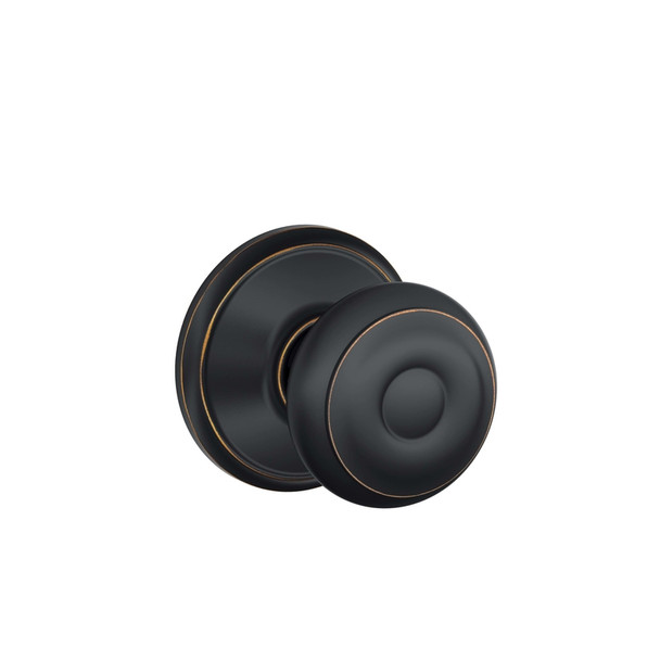 Schlage Georgian Passage Door Knob in Aged Bronze, F10GEO716