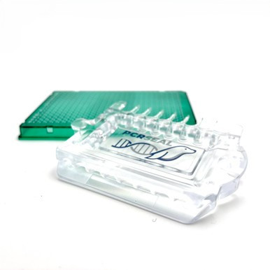 PCRSEAL-TOOL capping gadget next to 384-well green qPCR plate