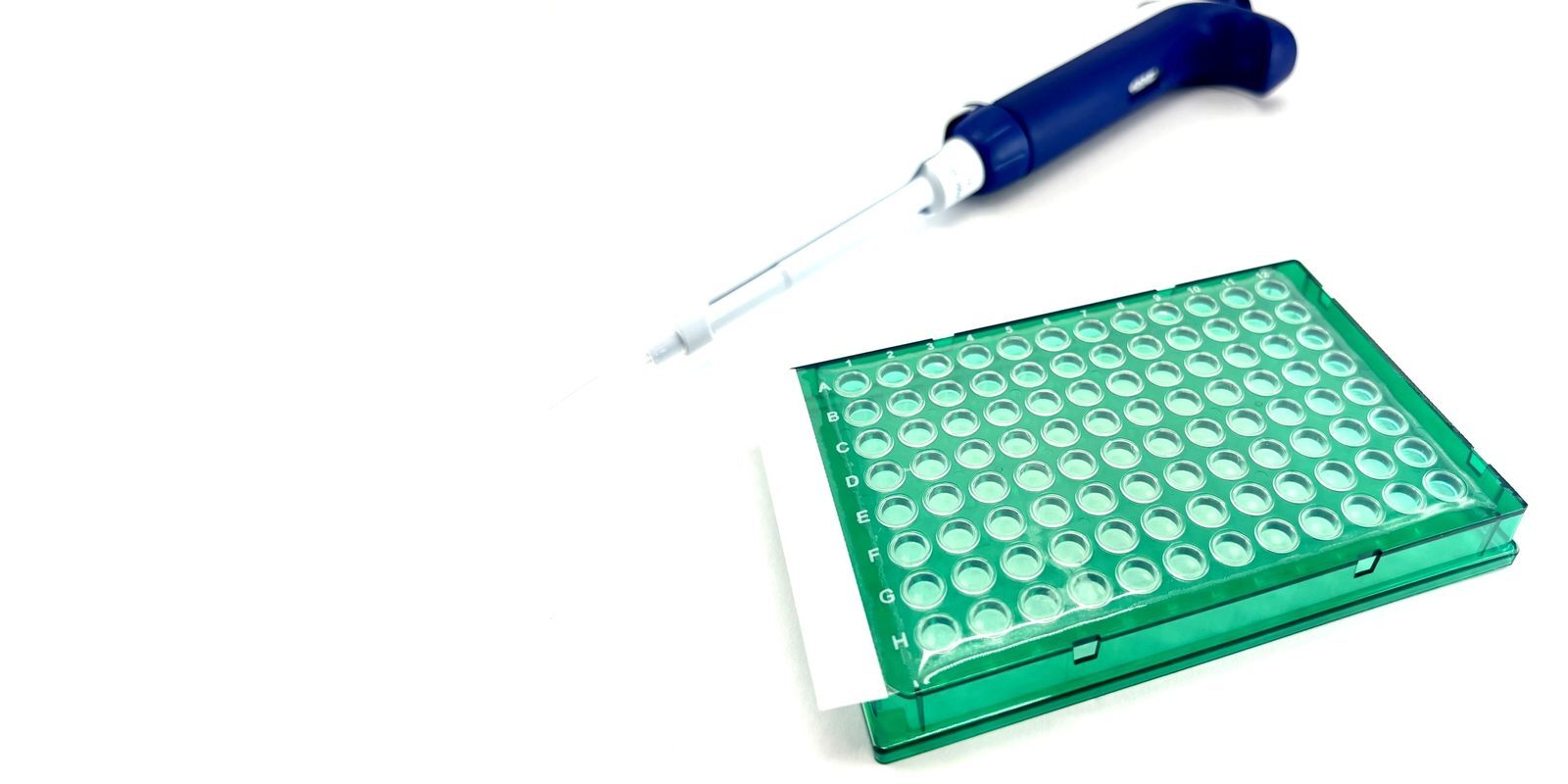 PCRSeal sealing film on 96-well plate with pipette