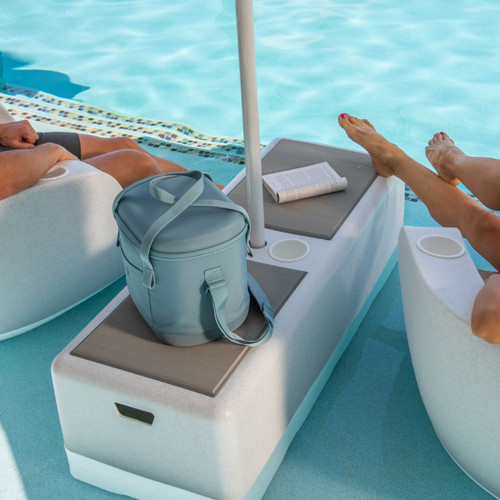 Dash Bench with pad between two moon chairs and holding an umbrella