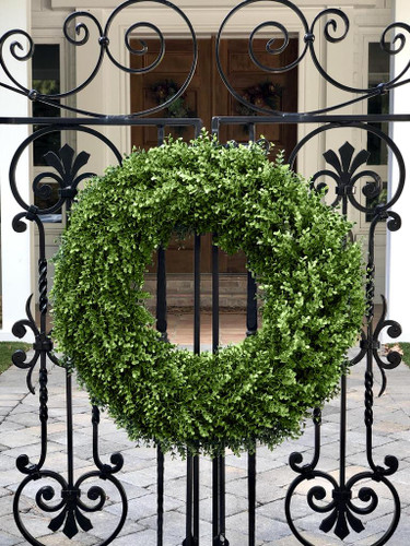 A welcoming wreath outdoors year round in full sun for years to come
