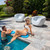 Moon Chairs with rad pad poolside cushions and wide ripple umbrella table