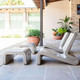 Sandstone Chair and ottoman on bluestone porch