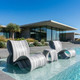 Baja Studio Gray Chairs and side table in pool tanning ledge