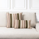 Ridgeway square and lumbar pillows styled on a neutral indoor sofa