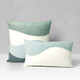 Contour Surf square and lumbar pillows styled on a neutral indoor sofa