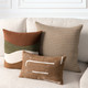 Cadence Sienna square and coordinating lumbar pillows styled on a neutral indoor sofa
