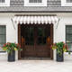 2 entry Planters with orange petunias