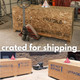 Custom wooden crate packaging for safe transport of Curve polished concrete in-pool loungers