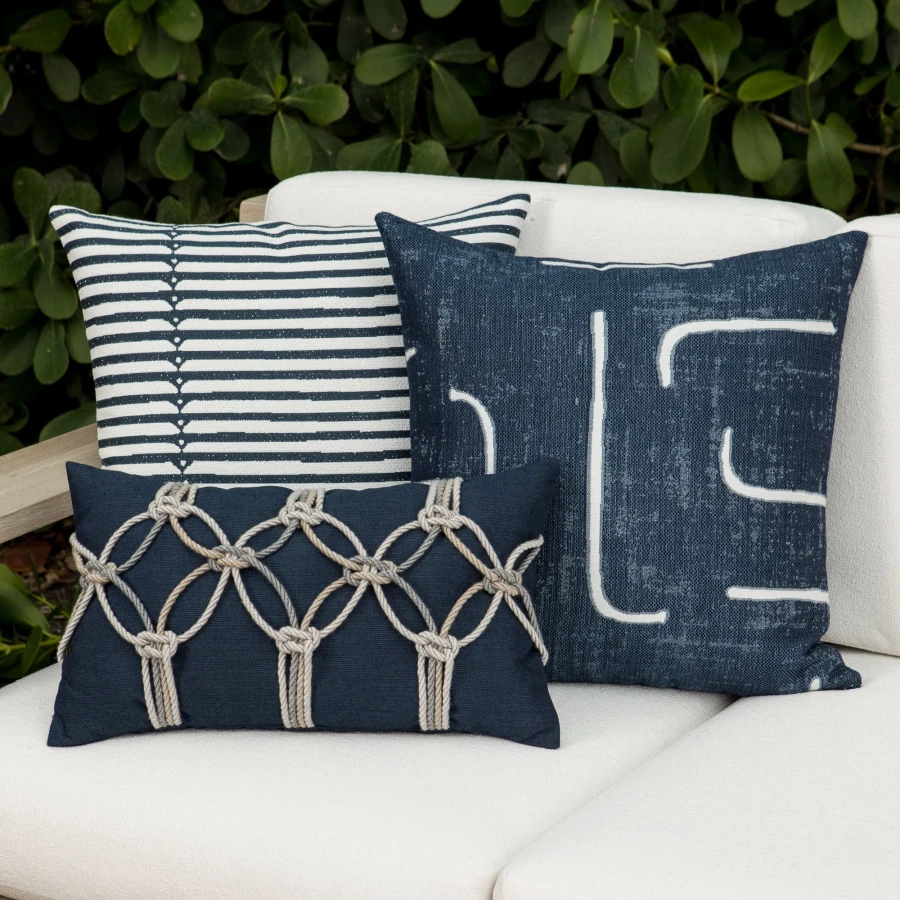 Denim Pillow Package styled on a neutral outdoor sofa | Instinct Denim, Sincerity Denim, and Indigo Rope, 3-Pack
