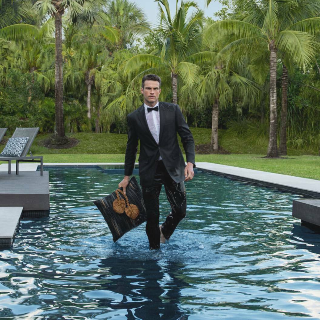 Elaine Smith outdoor pillows in pool