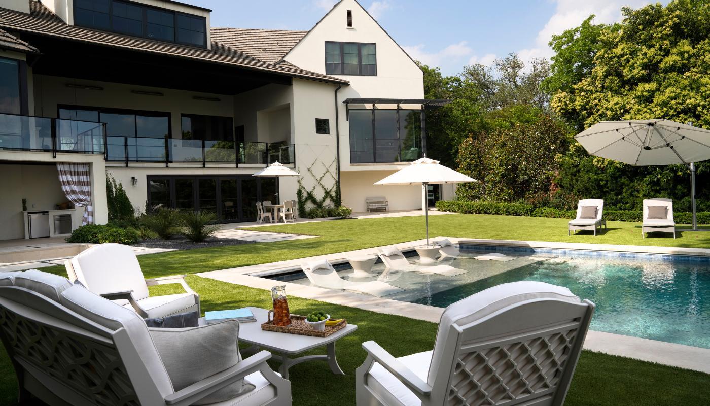 Ledge Lounger Signature Chaise on sun shelf with umbrella