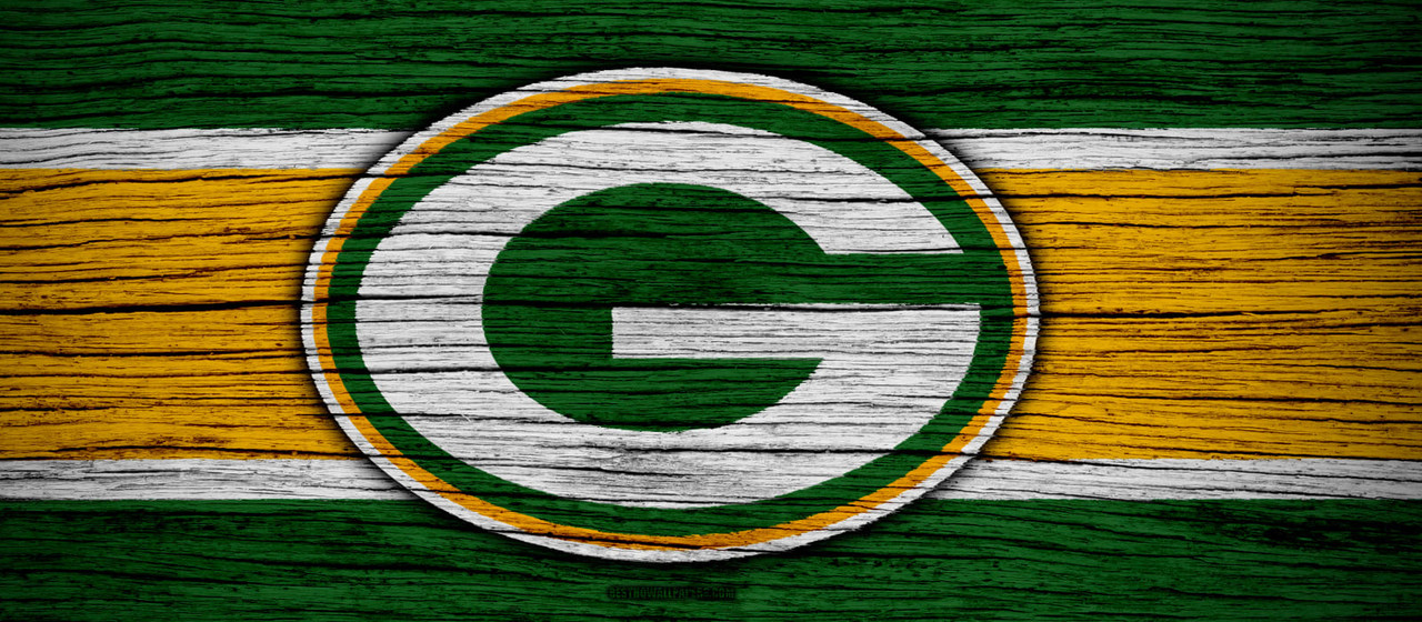 Green Bay Packers logo on a rustic wood background representing Wisconsin fan gifts.