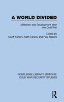 A World Divided : Militarism and Development after the Cold War by Paul Rogers (Hardcover)