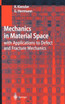 Mechanics in Material Space