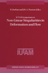 IUTAM Symposium on Non-Linear Singularities in Deformation and Flow