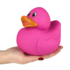 Rubber Duckies 5.5" Collectible Bulk 72 Pieces Six Assorted Colors Showing Fuchsia Ducky Left Side Angle in Hand Carnival Prizes Party Favors