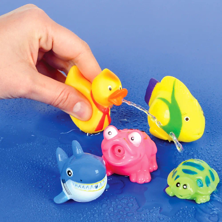 Rubber water squirting toy assortment 2-2.5" 600 pcs bulk toy gifts in use.