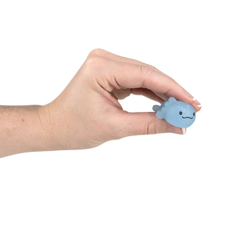 Gummy axolotl 1.5" 576 pcs bulk toy gifts in hand.